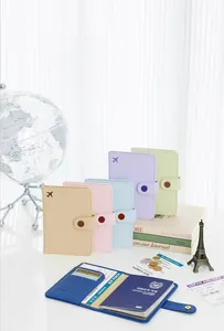 Stylish pastel PU leather travel passport holders with elegant airplane icons and snap closure
