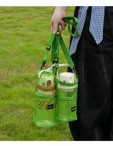 Detailed view of green mesh water bottle carrier with adjustable shoulder strap for hiking