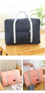 Large capacity foldable travel bag for suitcases shown in navy and coral pink