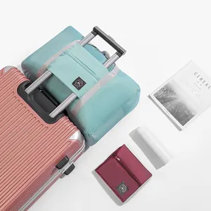 Waterproof large capacity foldable travel bag with trolley sleeve for luggage handle