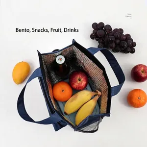 Large capacity insulated lunch bag with blue exterior and aluminum foil lining for food storage