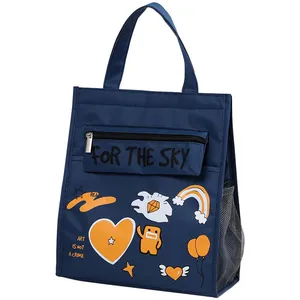 Navy blue insulated lunch bag for kids featuring cute cartoon prints and front pocket