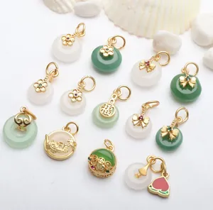 Macro detail view of various jade peace buckle pendants with golden traditional motifs