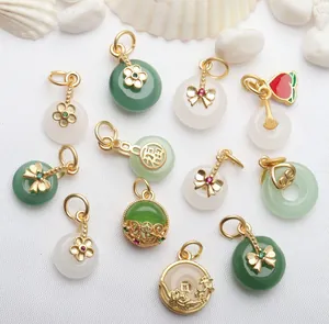 Group of jade safety buckle charms with ancient gold plating for DIY jewelry making.