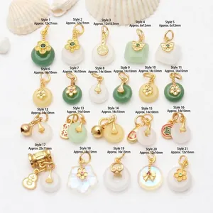 Collection of 21 traditional Chinese jade chalcedony pendants with gold-plated details