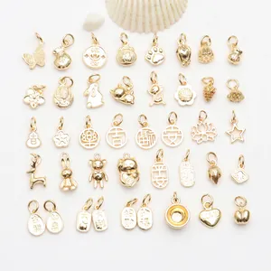 Collection de diverses breloques porte-bonheur plaquées or 18 carats pour bijoux DIY