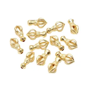 Exquisitos colgantes Vajra bañados en oro de 18k para joyería budista artesanal