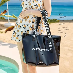 Large black glossy waterproof swimming bag with dry-wet separation for beach and pool use