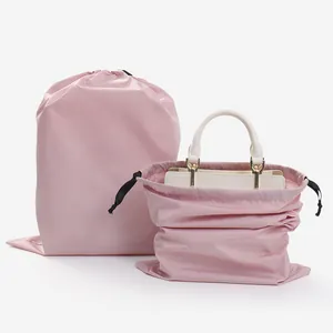 Set of two pink waterproof drawstring storage bags for travel organization