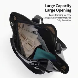 Spacious black waterproof bag for swimming, gym, and travel storage with open top