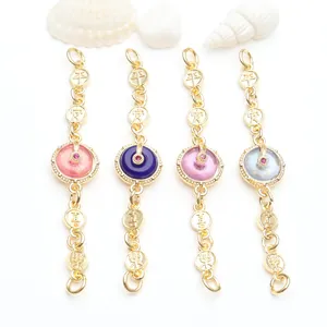 Detail shot of gold-plated Ping'an buckle jewelry extension chains with colored stones