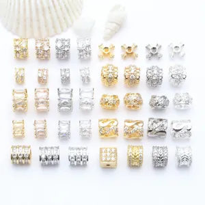 Detailansicht verschiedener vergoldeter und versilberter Zirkonia-Perlen für DIY-Schmuck
