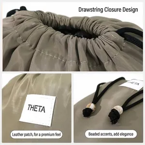 Professional waterproof drawstring storage bag with THETA logo for travel organization