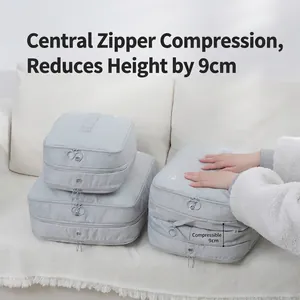 Grey waterproof compression packing cubes for travel suitcase organization