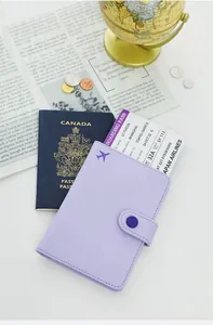 Lavender PU leather travel wallet with embossed airplane icon and boarding pass detail