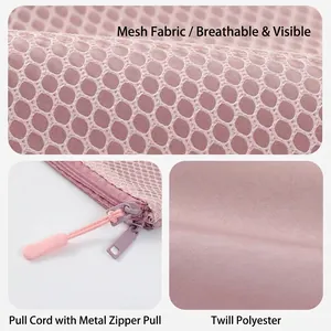 Compact pink mesh travel storage bag with breathable fabric and metal zipper pull