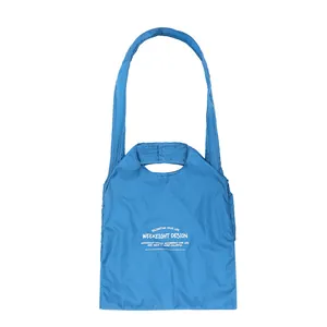 Lightweight blue foldable outdoor tote bag featuring Weekeight Design printed logo branding