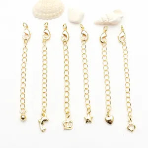 Cadenas de extensión doradas con cierres de mosquetón y colgantes para joyería DIY