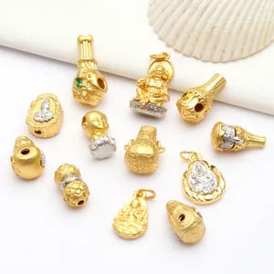 Surtido de cuentas budistas y colgantes de Ganesha en oro antiguo para joyas DIY.