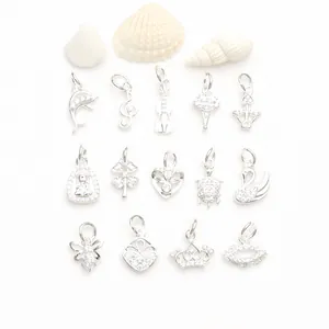 Detailansicht von 14K Gold gefüllten CZ-Anhängern in verschiedenen Formen für DIY-Schmuck