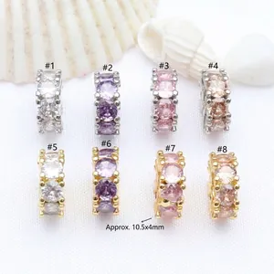 Detailed view of 8 colorful cubic zirconia spacer beads for DIY jewelry, 10.5x4mm