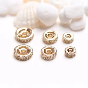 Close-up of 14K gold-filled micro-pave zircon rondelle spacer beads for DIY jewelry