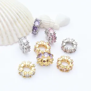 High quality detailed view of 18k gold plated copper spacer beads with colorful zircons for DIY
