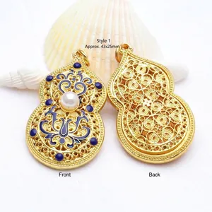 Exquisite vintage gold-plated gourd pendant featuring blue enamel and a central pearl inlay