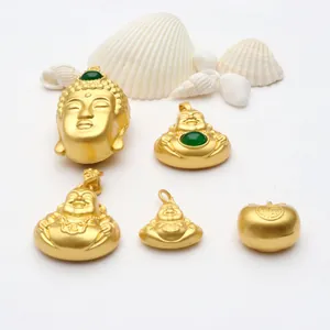 Collection of gold-plated Buddha pendants with jade inlays for DIY jewelry making.