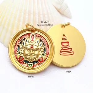 Detailed view of enamel gold-plated Buddhist pendant with deity and stupa symbols