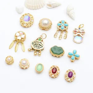 Exquisite variety of ancient gold style DIY jewelry charms with colorful enamel and stones