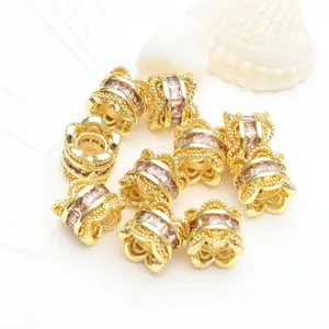 Detail view of 14K gold filled spacer beads with micro-pave pink zircon for DIY