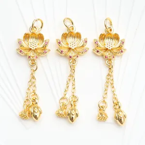 Close-up of 18K gold-plated lotus pendant set with pink zircon and dangling floral charms
