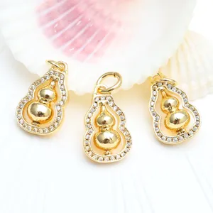 Detailed view of 18K gold plated rotatable gourd pendants with micro-inlaid zircons
