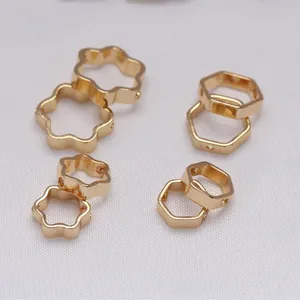 Close-up of 14K gold filled flower and hexagon jewelry beads for DIY crafting