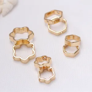 Detail view of 14K gold filled jewelry findings in various geometric shapes for DIY
