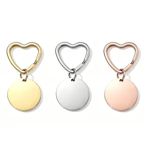 Detailansicht herzförmiger Schlüsselanhänger mit runden Anhängern in Gold Silber Roségold
