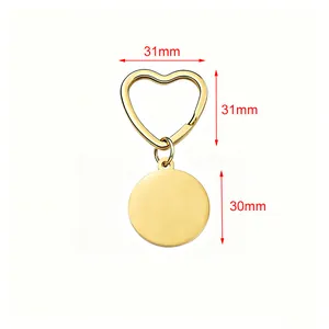 Technical drawing showing exact dimensions for gold heart-shaped keychain and round tag