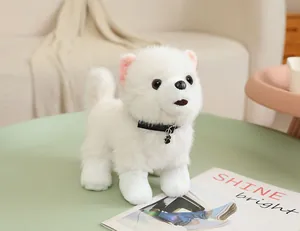 Close-up of fluffy white Pomeranian plush toy with black collar and paw pendant