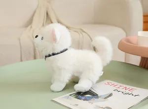 A close-up shot of a realistic white Pomeranian plush toy dog displayed on a green table.