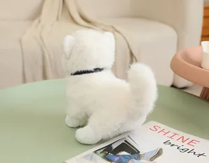 Rear view of a fluffy white simulation Pomeranian plush toy in a cozy home setting