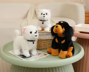 Realistic plush dog toy set featuring white Pomeranian and Rottweiler models on a green table
