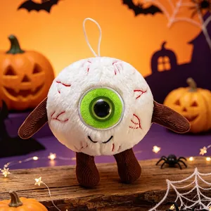 Gruseliges Halloween Augapfel-Plüschtier mit grünen Details im Festlook