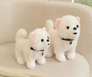 Realistic white Pomeranian plush toy dogs on a soft sofa, detailed fur texture