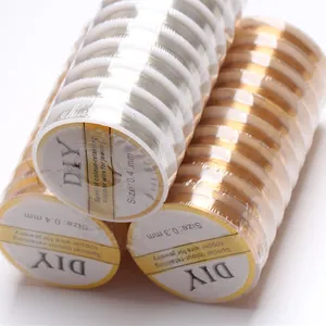 Detail view of 14K gold-filled and silver copper wire rolls for jewelry making DIY
