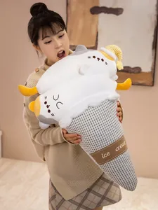 Young woman holding a creative large ice cream cone plush pillow with cute cat faces