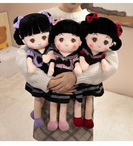 Three cute academy style plush girl dolls in purple pink and red school uniforms