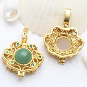 Detail view of traditional Chinese filigree Ruyi lock pendant with green jade