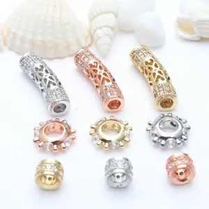 Detailed macro view of DIY zirconia spacer beads and hollow curved tube accessories set