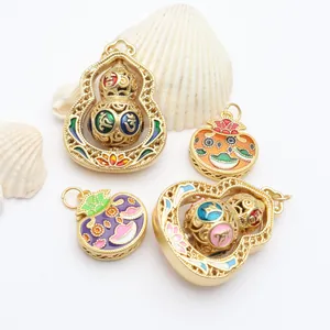 Macro view of gold-plated rotating calabash pendants with colorful enamel charms